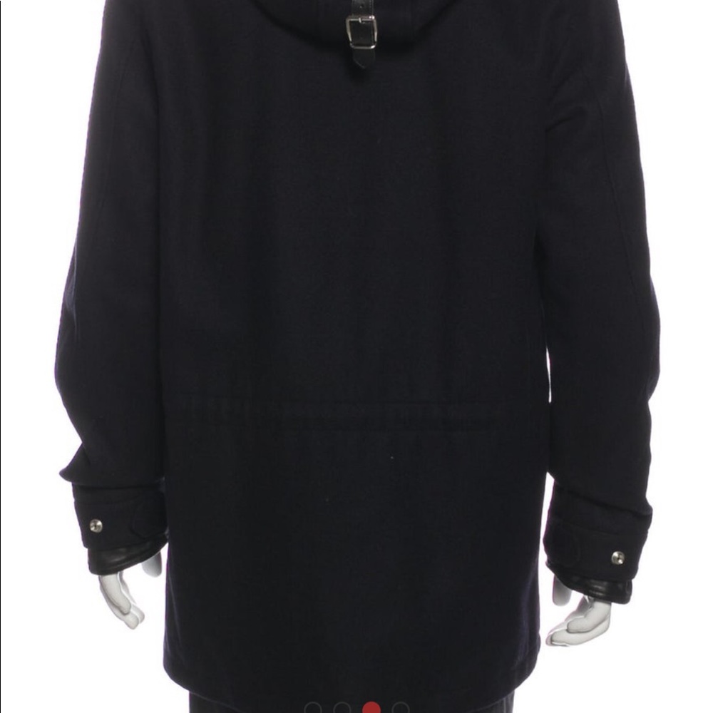Sandro Wool Parka
With Hood
Faux Fur Trim & Collar
Flap Pockets & Zip Closure